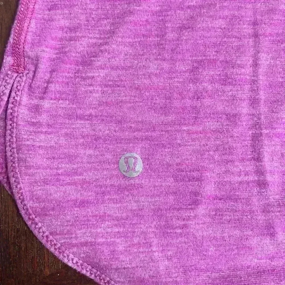 Lululemon What The Sport Singlet II
Heathered Ultra Violet / Alarming - Picture 8 of 10